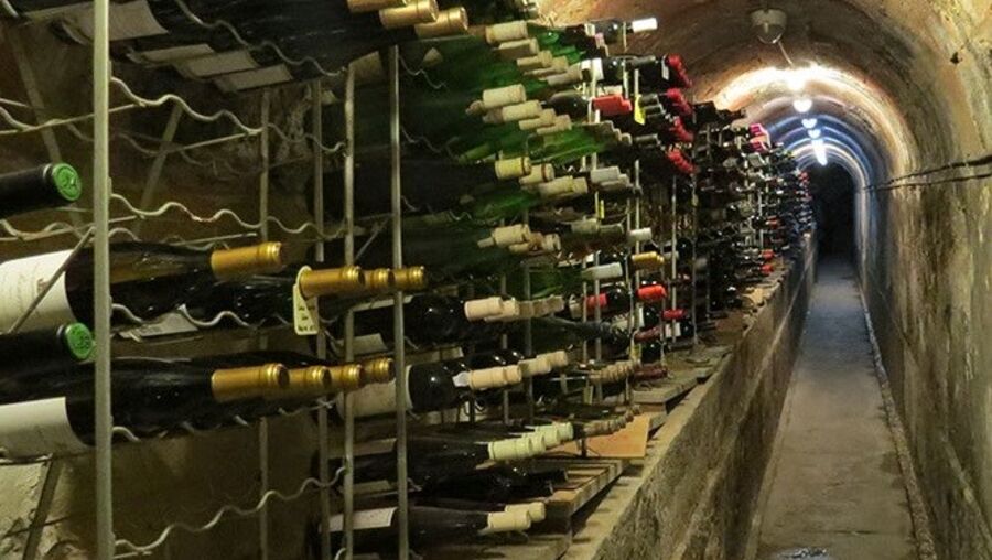 In the Chafariz, wine bottles are stored in the tunnels built to deliver water to the city